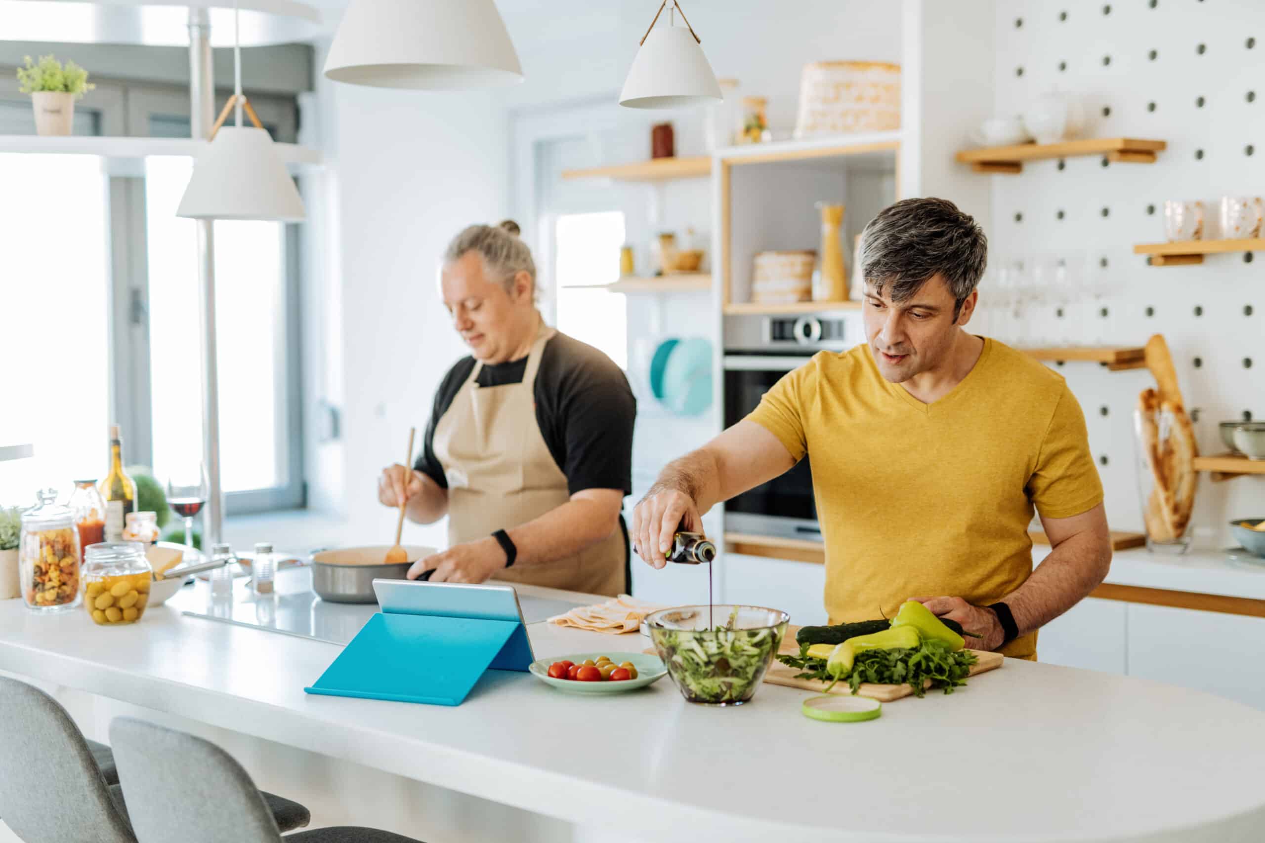 Mature Gay Couple Cooking Together