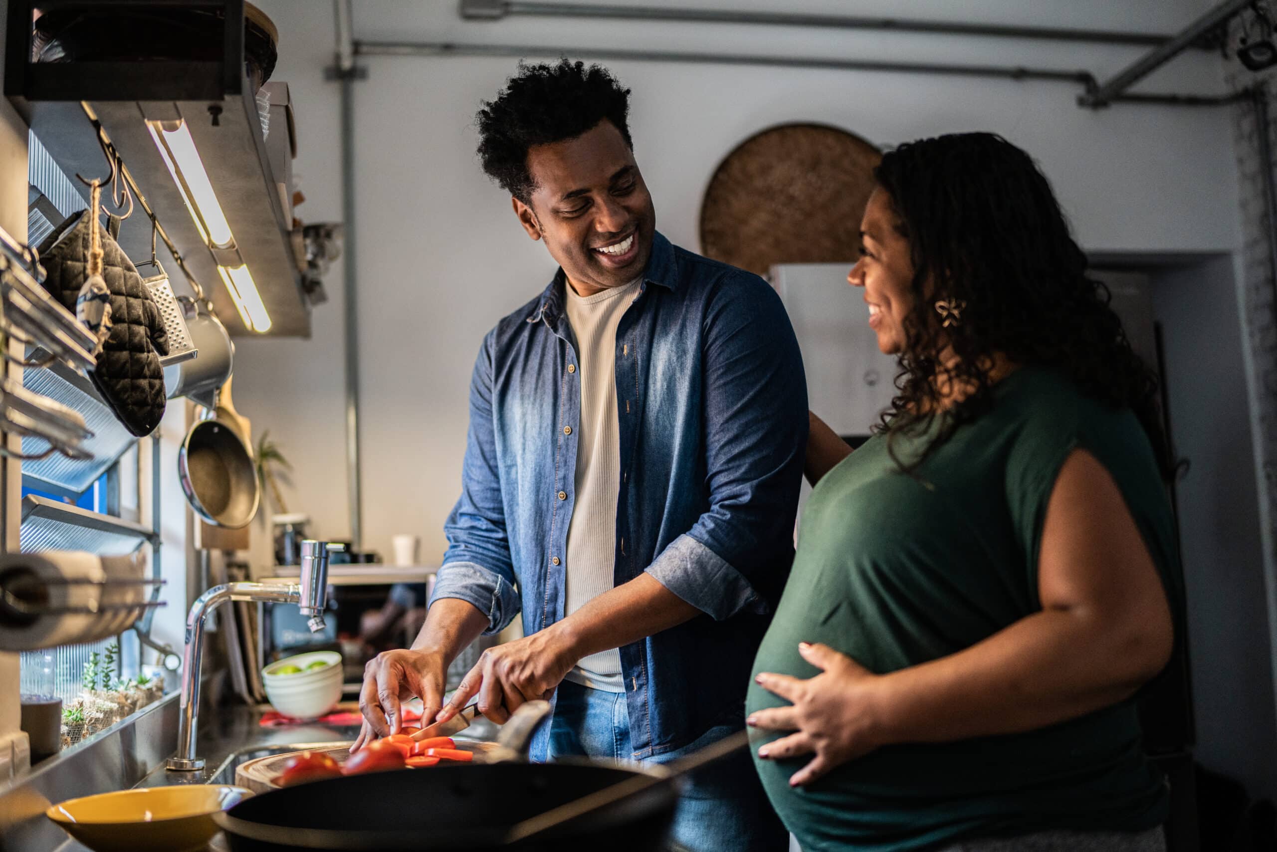 Prenatal Nutrition 1 Dietitian Group Couple Cooking Together At Home