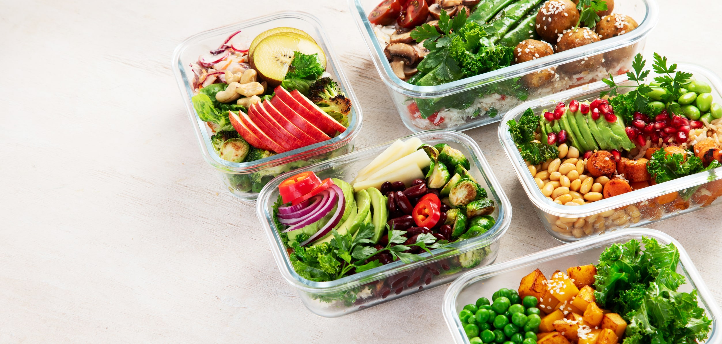 Dietitian Meal Plan 1 Dietitian Group Preparing Healthy Meals For Vegans. Food And Snacks In Containers On A Light Background. Top View. Panorama With Copy Space.