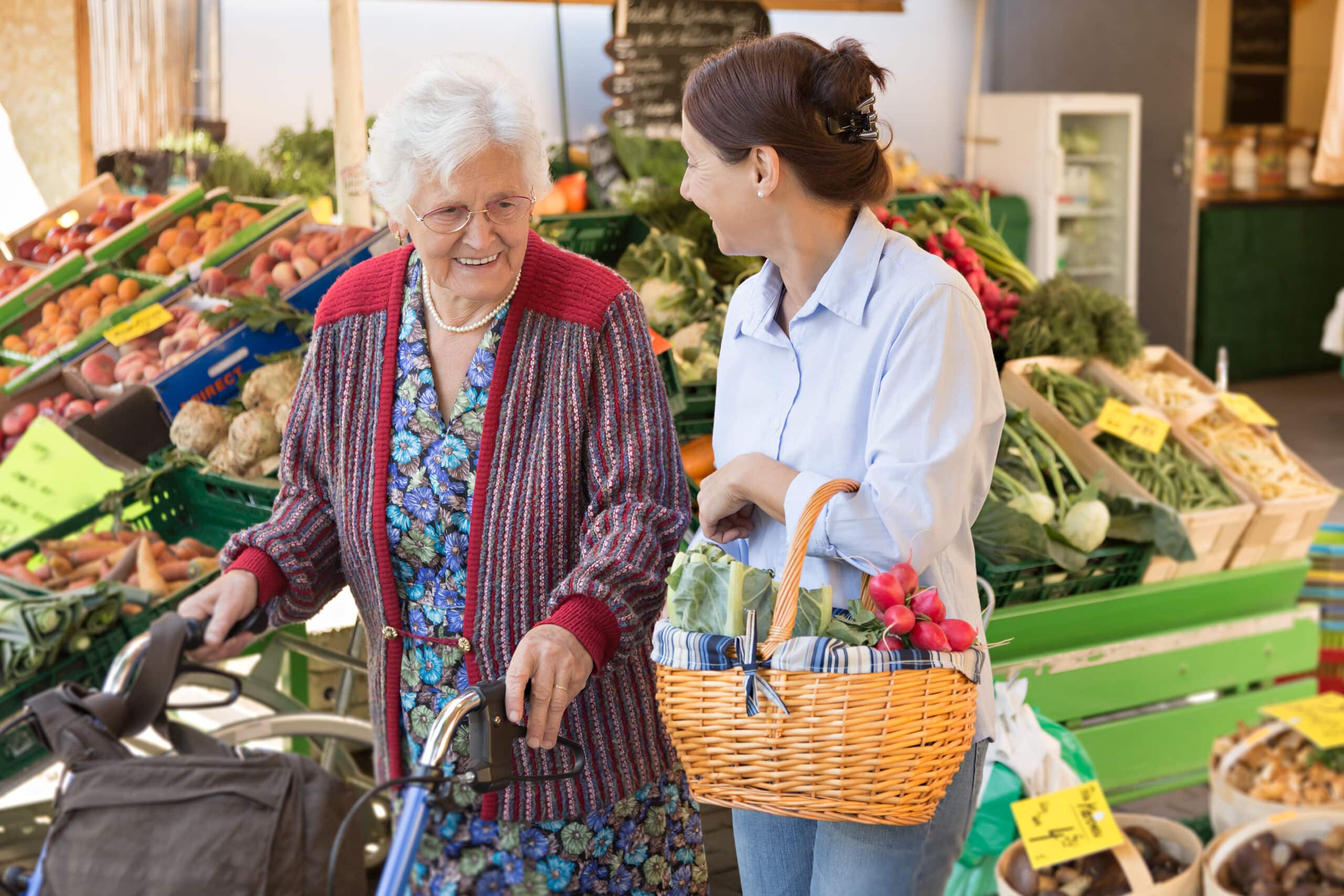 Assisted Living - Senior Woman With Caregiver Shopping