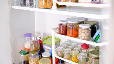 Shelves with organized bottles