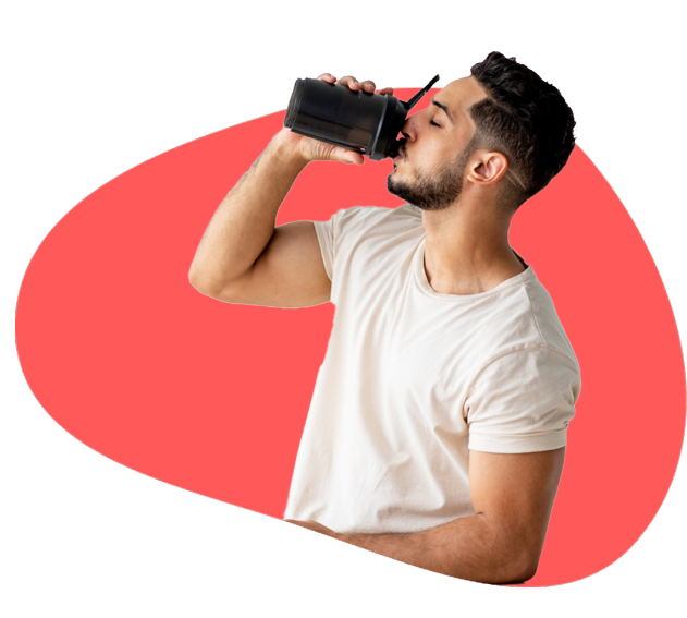 A young muscular man drinking something