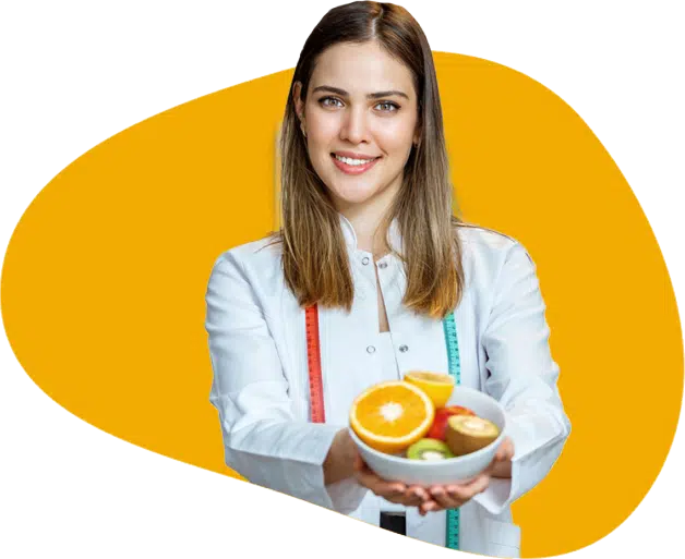 Female dietitian offering a bowl of fruits