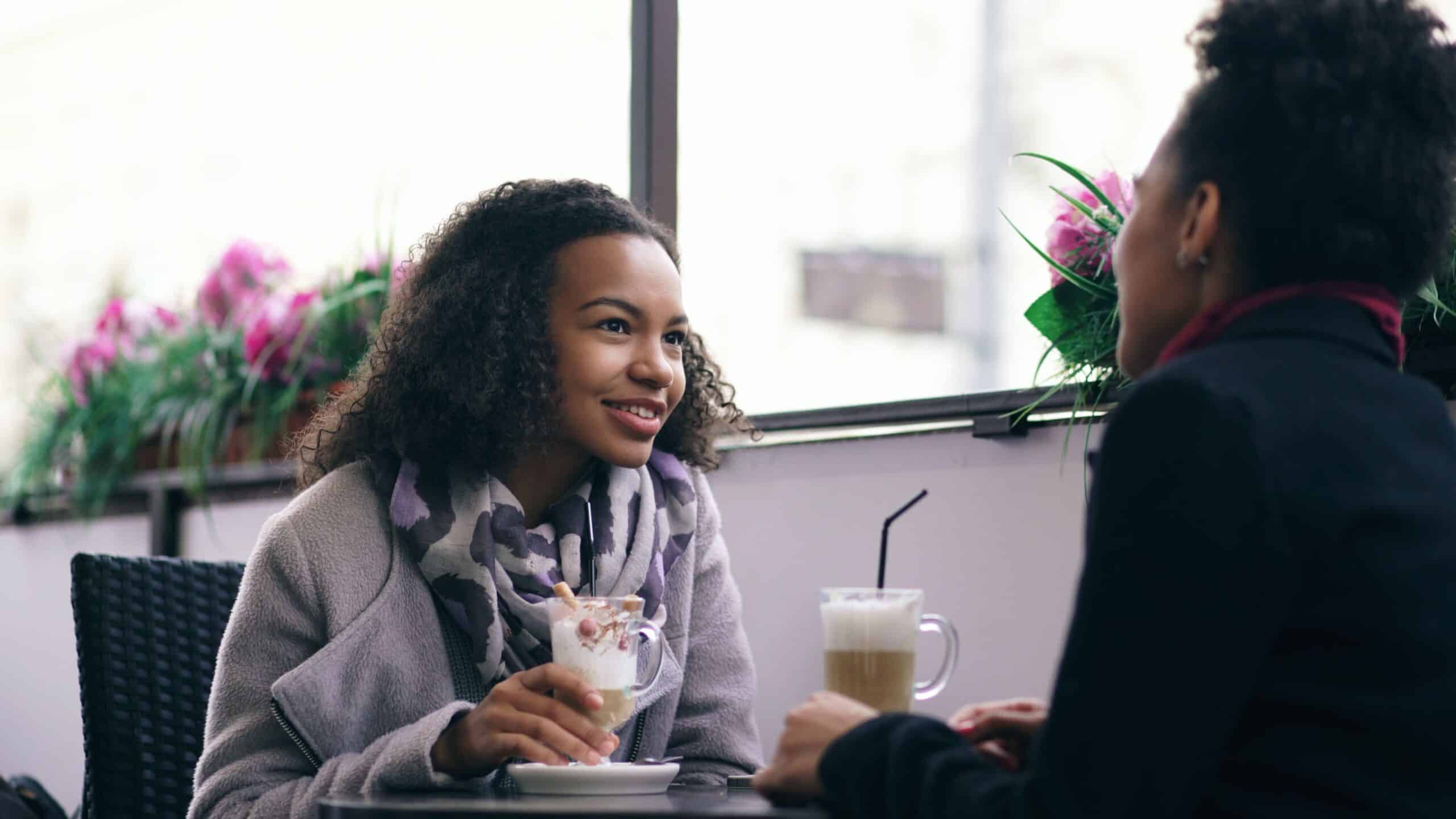 Two Friends Enjoying Coffee Together.