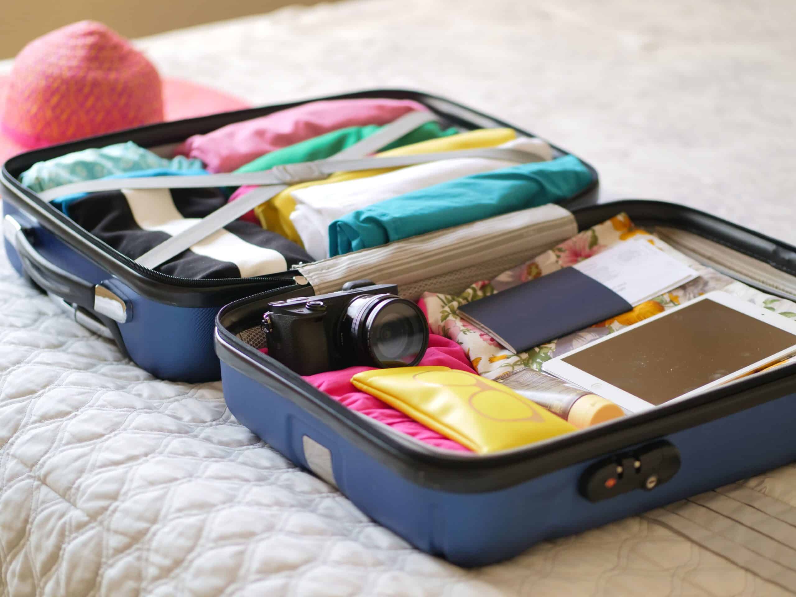 Carry-On Suitcase Packed With An Insulated Glp-1 Medication Travel Case, Camera, And Passport